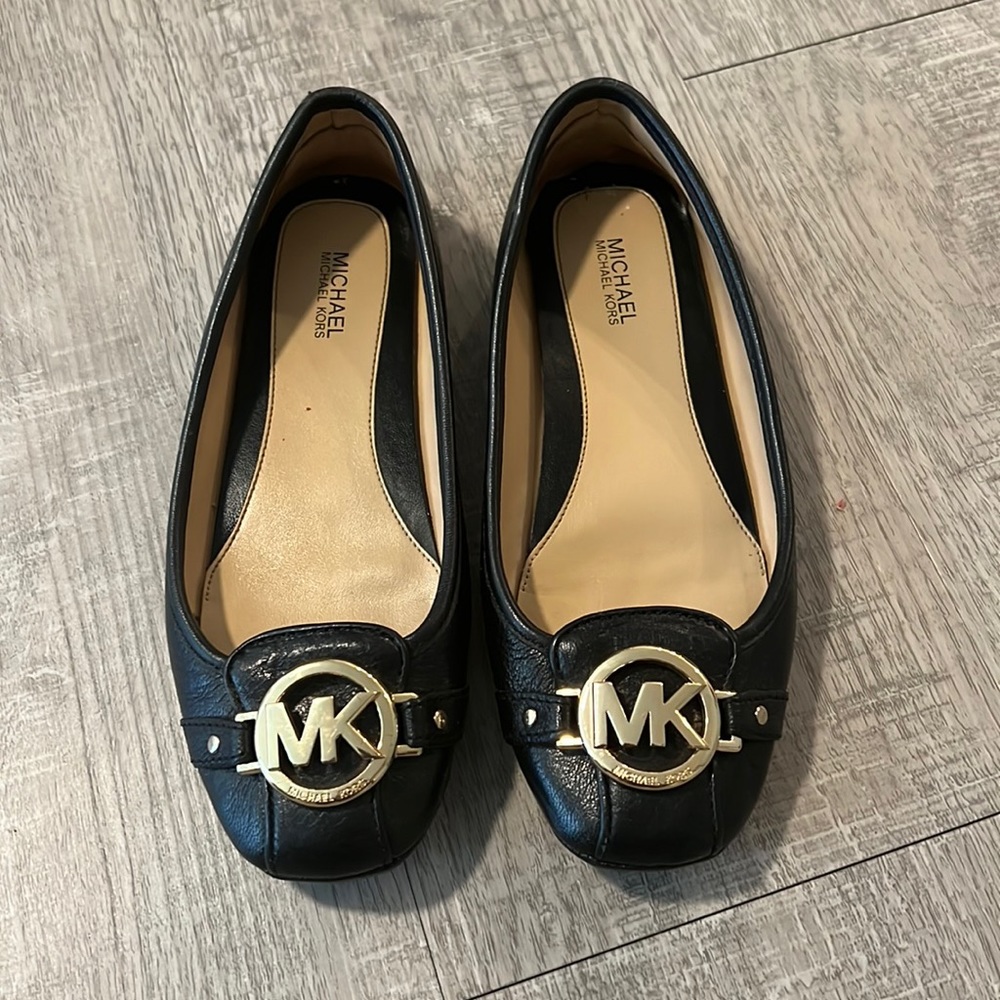 Michael Kors size 6 Black and Gold Flats